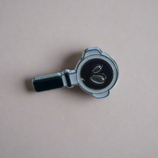 Metallic valve stem cap on a beige background